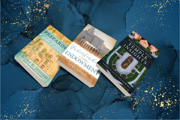 Three temple books on a blue marble surface with gold accents