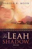 Book cover of 'The Leah Shadow' by Harold K. Moon with a woman's face and a scenic background.