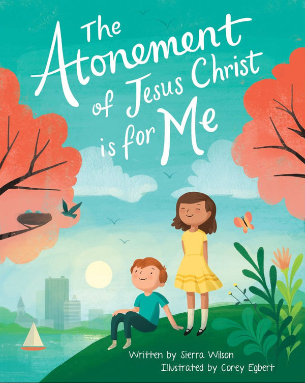 Cover of the book 'The Atonement of Jesus Christ is for Me' featuring illustrations of a girl and a boy sitting on a grassy hill with a cityscape and a partly cloudy sky in the background.